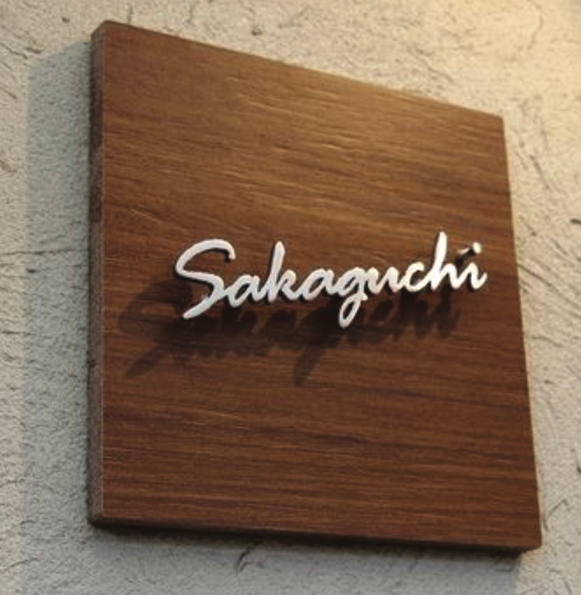 wooden name plate signage